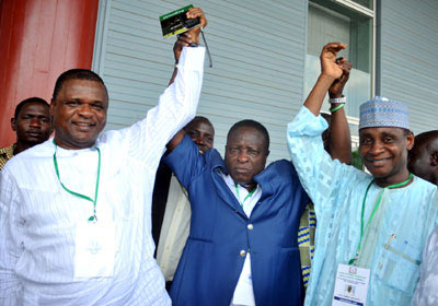 BEFORE THE CRACK: Dr. Rafiu Ladipo (m) raises the hands of Chief Mike Umeh (l) and Aminu Maigari after their election in 2010.