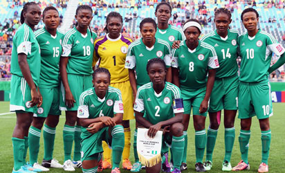 Players of Nigeria pose for a team photo prior to the FIFA U-20 Women's World Cup Canada 2014 group C match between Korea Republic and Nigeria at Moncton Stadium on August 9, 2014 in Moncton, Canada. (Photo FIFA)