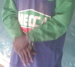 The suspect in chains