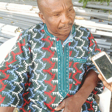 *Bereaved husband Leonard Onunkwo