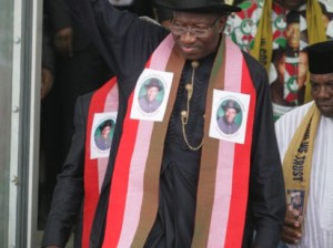 PRESIDENT GOODLUCK AKNOLEDGING CHEERS FROM HIS SUPPORTES