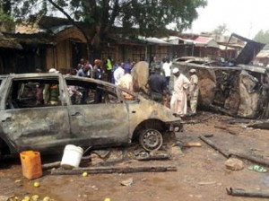BOMBING—Scene of the bomb blast at Dukku Motor Park in Gombe where 20 people died and 25 sustained various degrees of injuries, yesterday. Photo: NAN.