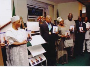 •The author Chief Poly Emenike(2nd left) with other dignitaries during the presentation