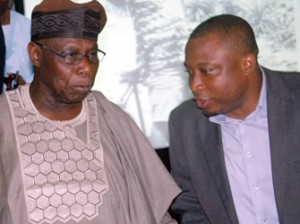 Author/Former President Olusegun Obasanjo, (left) with the Publisher of the Book ,Dr Eghosa Imasuen, at the presentation of a Book Tittle: ''My Watch'', By Olusegun Obasanjo in Lagos... yersterday 09/12/2014