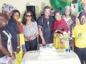 •National Executives of Association of Nigerian Authors and representative of the president,Molara Wood cutting the 33rd anniversary cake in Ibadan recently