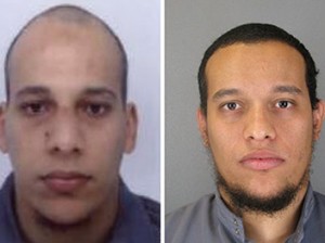 This combo shows handout photos released by French Police in Paris early on January 8, 2015 of suspects Cherif Kouachi (L), aged 32, and his brother Said Kouachi (R), aged 34, wanted in connection with an attack at the satirical weekly Charlie Hebdo in the French capital that killed at least 12 people. French police on January 8 published photos of the two brothers wanted as suspects over the bloody massacre at the magazine in Paris as they launched an appeal to the public for information. AFP PHOTO / FRENCH POLICE
-- EDITORS NOTE --- RESTRICTED TO EDITORIAL USE -- MANDATORY CREDIT "AFP PHOTO / FRENCH POLICE" NO MARKETING - NO ADVERTISING CAMPAIGNS -- DISTRIBUTED AS A SERVICE TO CLIENTS