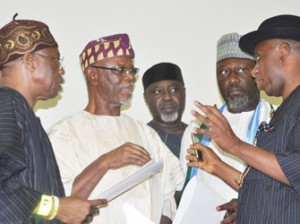 APC Joint Leadership Meeting:  From left, National Publicity Secretary of APC Alh. Mohammed Lai, National Chairman John Oyegun, National Auditor Chief Morgan, Senatorial Candidate of APC, Hon Dino Melayi  and APC Presidential Campaign Organization and River State Governor Rotimi Amechi discussing during APC Joint Leadership Meeting held in Abuja. Photo by Gbemiga Olamikan.