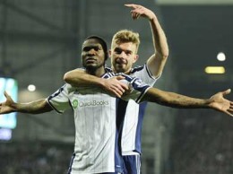 CELEBRATION... West Brom striker Brown Ideye celebrates with team-mate James Morrison (right) after scoring the opener  against Swansea  Wednesday night. West Brom won 2-0.