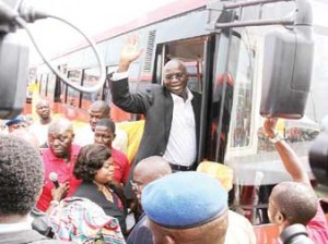 Governor Fashola aboard one of the 100 air-conditioned Wifi buses
