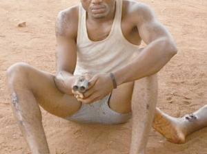 Suspect:..., the suspect, brandishing a locally made pistol
