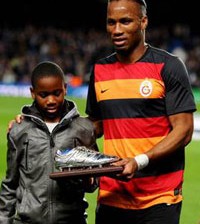 Drogba (r) and Son, Isaac