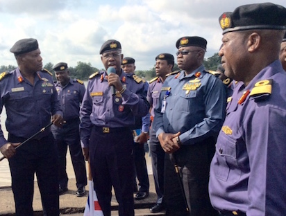 EXERCISE EAGLE EYE: Rear Admiral Adeniyi Oshinowo, Naval Chief of Training & Operations (on the mic) at the flagging off of Exercise Eagle Eye on behalf of Chief of Naval Staff, CNS, Vice Admiral Ibok-Ete Ekwe Ibas, in Warri, Delta state on Thursday. Photo by Egufe Yafugborh