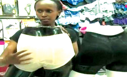 A Dealer Holding Artificial Butt A Dealer Holding Artificial Butt