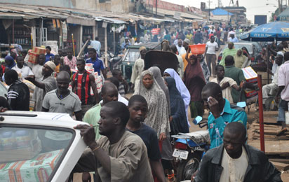 Crowd at the  Abubakar Gunmi Central Market in Kaduna State on June 24 after relaxation of 24hrs curfew engendered  by multiple bomb attacks which killed many in the state  Photo by Olu Ajayi.