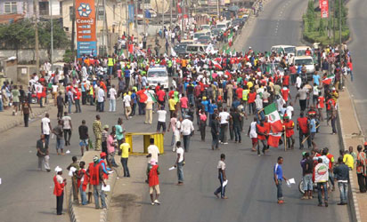 Labour leaders and workers protesting fuel price increases