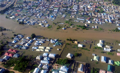 File photo: Areal view of Lokoja, Kogi State...under  the siege of flood