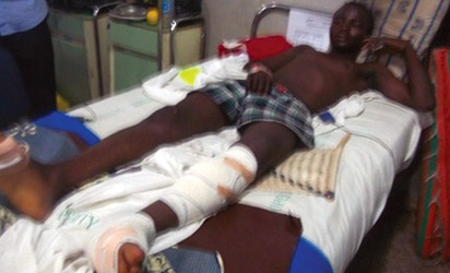 One of the lucky survivors on his hospital bed