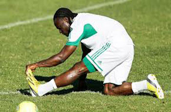 EXERCISING.... Super Eagles striker excercising his foot before a match. Will he be fit enough to battle Burkina Faso tomorrow? 