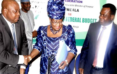2013 Budget: From left, Accountant General of the Federation , Mr. Jonah Otunla, Minister of Finance, Dr. Ngozi Okonjo Iweala  and Director General , Budget Office of the Federation, Dr. Bright Okogu at a Press briefing on the 2013 Federal Budget in Abuja. Photo by Gbemiga Olamikan. 