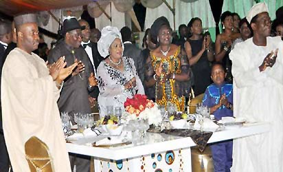 L-R Governor Godswill Akpabio of Akwa Ibom state; President Goodluck Jonathan, his wife Patience; Wife of the Senate president Mrs Helen Mark; Nollwood actor Chinedu Ikediezu (aka Aki) and President of the Manufacturers Association of Nigeria Chief Kola Jimodu at the Presidential dinner to celebrate Nollywood 