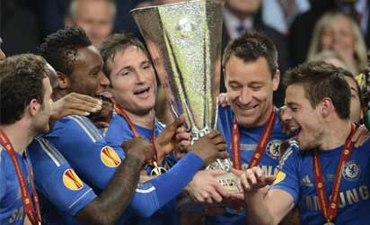 Chelsea's players celebrate with their trophy at the end of the UEFA Europa League final football match between Benfica and Chelsea on May 15, 2013 at Amsterdam Arena in Amsterdam. Chelsea won 2-1.  AFP .