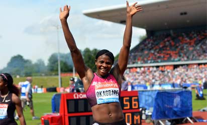Nigeria's Blessing Okagbare celebrates winning the women's 200m during the IAAF Diamond League athletics meeting at The Alexander Stadium in Birmingham, central England on June 30, 2013. AFP PHOTO