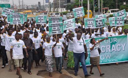 Cross section of Coalition of Civil Societies, organizing Save our Democracy Rally, which is in response to the Rivers state political debacle, rally take off at testing grand and terminate at Lagos state Governor's office. Photo: Bunmi Azeez and Tosin Aladesokun