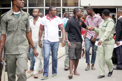 Suspects in the murder of The UNIPORT FOUR at the Rivers State High Court,Port Harcourt, yesterday. Photo: Nwankpa Chijioke