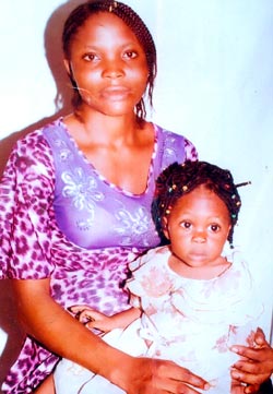 *Mrs. Christiana Lulu and her daughter Promise