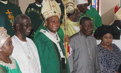 ANENIH @ 80—President Goodluck Jonathan flanked by the First Lady, Dame Patience Jonathan (2r) and Cardinal John Onaiyekan, Chairman PDP Board of Trustees, Chief Tony Anenih and his wife, Mrs. Anenih (l) watch after a Holy Mass celebrated to mark Chief Anenih's 80th birthday at Our Lady Queen of Nigeria, Pro-Cathedral, Area 3, Garki, Abuja, yesterday. Photo: Abayomi Adeshida.