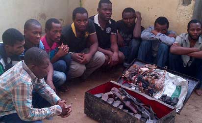 The Ikeja airport robbery gang with their box of rifles and charms