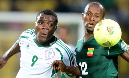 BATTLE......Emmanuel Emenike (left) of Nigeria battles  for the ball with Ethiopia’s  Biyadiglign Elyas  during a match at AFCON 2013 