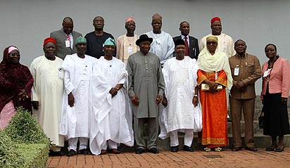 President Goodluck Jonathan flanked by Vice President Namadi Sambo (4th right) and the Chairman, Presidential Advisory Committee on the National Conference, Dr. Femi Okurounmu while other committee members watched shortly after the inauguration of the Committee at the State House, Abuja. Photo by Abayomi Adeshida.