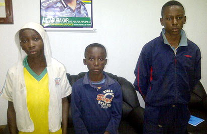 *would-be stowaways: From left— Onyedikachi Ukpabio 14; Lateef Popoola 13, and Joshua Amadi, 14.