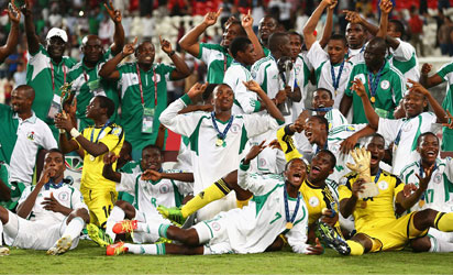 ABU DHABI, UNITED ARAB EMIRATES - NOVEMBER 08: The Nigeria team celebrate their victory after the FIFA World Cup UAE 2013 Final between Nigeria and Mexico at Mohamed Bin Zayed Stadium on November 8, 2013 in Abu Dhabi, United Arab Emirates. (FIFA/FIFA)