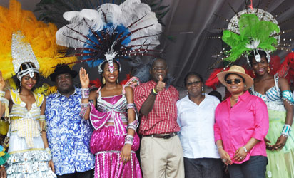Chief Edem Duke, Minister of Culture and Tourism and National Orientation[2nd left], Gov. Babatunde Fashola of Lagos state[4th left], Dame Abimbola Fashola[3rd right], Mrs. Adejoke Orelope-Adefulire, Deputy Governor Lagos state[2nd right], with Carnival's Queen, at the 2014 Lagos Carnival in Awolowo road Ikoyi, Tafawa Balewa Square, Lagos Island, on Monday. Photo: Bunmi Azeez