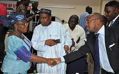 *Briefing on Result of GDP in Nigeria: Minister of Finance and Coordinating Minister of Economy, Dr. Ngozi Okonjo –Iweala chatting with Minister of National Planning Amb. Bashiru Yuguda and Statistician –General of the Federation and CEO of National Bureau of Statistics Dr. Yemi Kale during presentation of Preliminary Results of the Rebased Nominal Gross Domestic Product ( GDP) Estimates from Nigeria 2010 to 2013 held in Abuja. Photo by Gbemiga Olamikan.