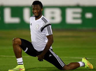 BRAZIL, Campinas : Nigeria's midfielder John Obi Mikel takes part in a training session in Campinas, Sao Paulo, on June 18, 2014, during the 2014 FIFA Football World Cup. AFP PHOTO 