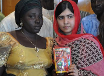Malala Yousafzai Pakistani with one of the parent of Chibok School girls