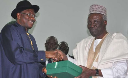 Confab Closes— From left: President Goodluck Jonathan receiving Report of 2014 National Conference from Chairman of the Confab, Justice Idris Kutigi at the closing ceremony of conference in Abuja, yesterday. Photo: Gbemiga Olamikan.