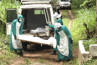 Health workers evacuating the remains of an Ebola  Virus Disease victim.