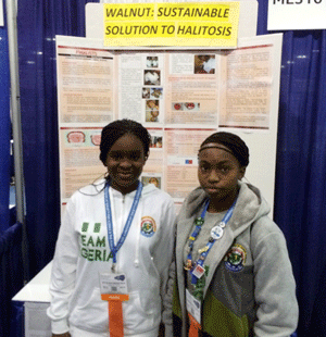 *Eveshorhema Samuel-Alli (left) and Ibukunoluwa Oladeinde proudly representing Nigeria at the 2014 Intel International Science and Engineering Fair in Los Angeles, California, USA.