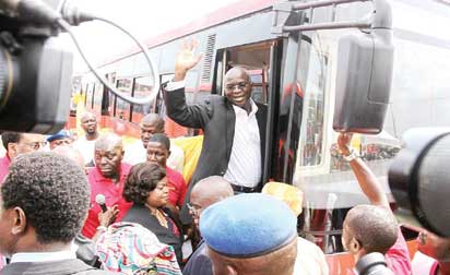 Governor Fashola aboard one of the 100 air-conditioned Wifi buses