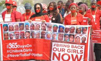 Members of #BringBackOurGirls (#BBOG) group on a silence protest match to show  the sorrowful state of the abducted Chibok school girls who have being in captivity a year ago in Abuja yesterday. Photo  by Gbemiga Olamikan