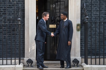 Britain's Prime Minister David Cameron (L) shakes hands with Nigeria's President-elect Muhammadu Buhari following a meeting in Downing Street, central London on May 23, 2015. AFP PHOTO / LEON NEAL