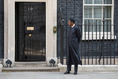 Nigeria's President-elect Muhammadu Buhari stands in Downing Street following a meeting with Britain's Prime Minister David Cameron in central London on May 23, 2015. AFP PHOTO / LEON NEAL