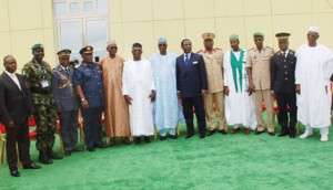 MEETING: Permanent Secretary, Ministry of Defence, Alhaji Ismaila Aliyu (middle); Chief of Defence Staff, Air Chief Marshal Alex Badeh (4th left); Executive Secretary, Lake Chad Basin Commission, Mr Sanusi Abdullahi (4th right) and Chief of Defence Staff of Chad, Lt.- Gen.  Brahim Mahamat (5th right) and other Ministers of Defence and Chiefs of Defence of the Lake Chad Basin Commission's Member Countries and Benin Republic, at a meeting in Abuja, yesterday. Photo: Nan.