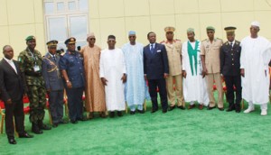 MEETING: Permanent Secretary, Ministry of Defence, Alhaji Ismaila Aliyu (middle); Chief of Defence Staff, Air Chief Marshal Alex Badeh (4th left); Executive Secretary, Lake Chad Basin Commission, Mr Sanusi Abdullahi (4th right) and Chief of Defence Staff of Chad, Lt.- Gen. Brahim Mahamat (5th right) and other Ministers of Defence and Chiefs of Defence of the Lake Chad Basin Commission's Member Countries and Benin Republic, at a meeting in Abuja, yesterday. Photo: Nan.