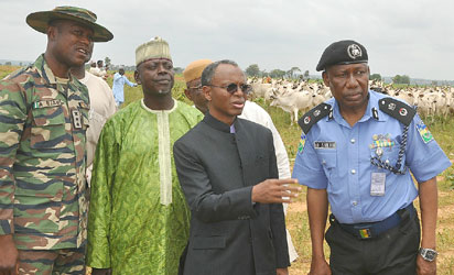 Gov El Rufai,  flanked by Kaduna State Police Commissioner, Shehu Umar (left), and  Captain A. Ujah at the ‘Sambisa Forest’ 