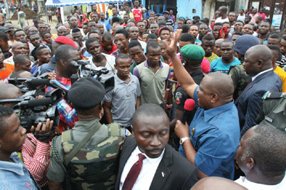Governor Wike appealing to the protesters (Inset) David Legbaraa, the slain bus driver